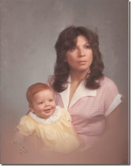 MONICA HOLDING A RED-HEADED BABY