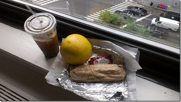 Egg white wrap with spinach and grilled chicken, grapefruit, iced coffee