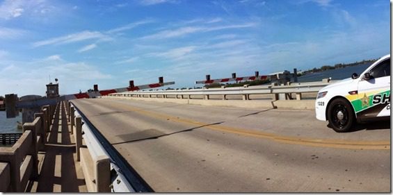 bridge is blocked and cop car (800x309)