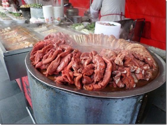 eating intestines in china on snack street food blog