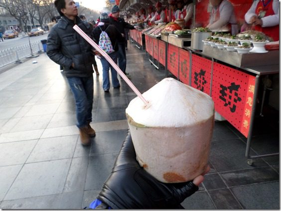 drinking coconut in china on snack street food blog