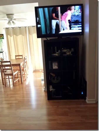watching tv and cleaning 2 (600x800)