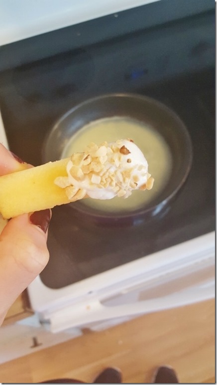 apple dipped in yogurt and nuts (450x800)