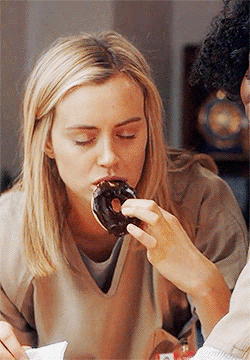 eating a donut oitnb