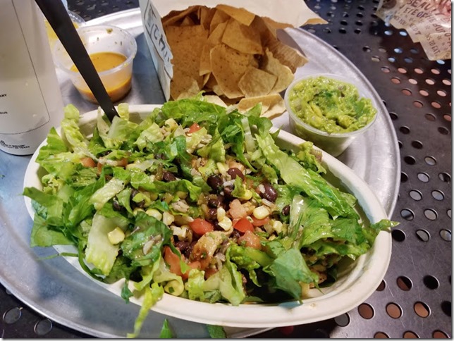 chipotle salad with chips and guac